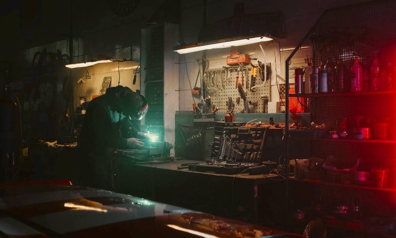 Cruz Automotive technician welding at the shop workbench